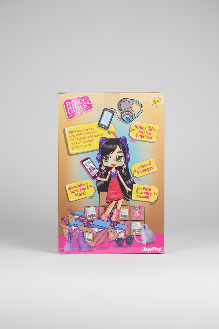 Boxy Girls toy packaging on a wooden floor
