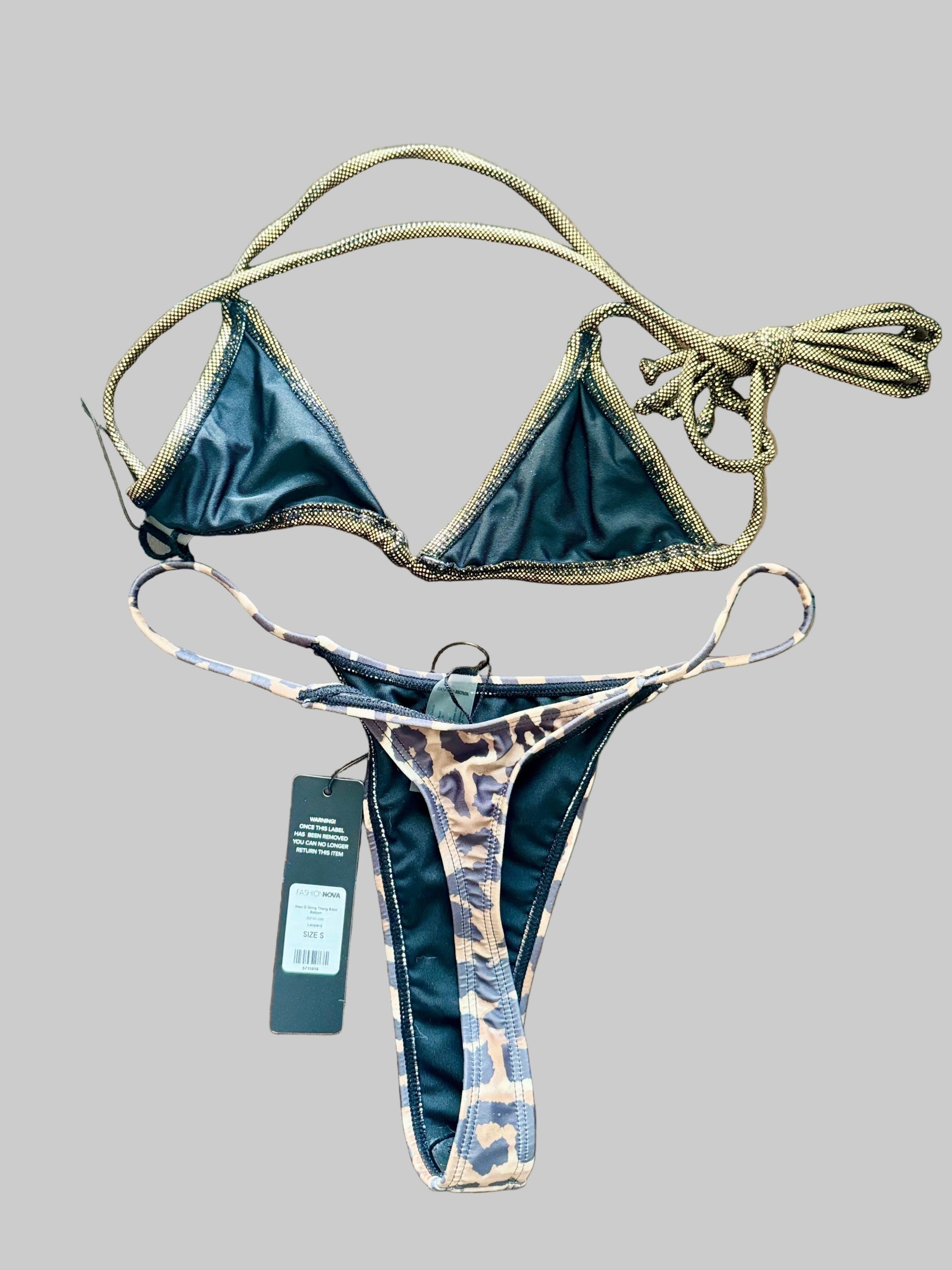 Bikini set with tags on a gray background