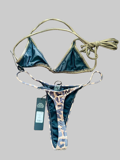 Bikini set with tags on a gray background